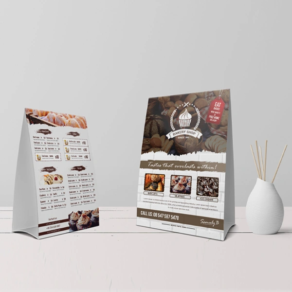 A stack of 2 8 x 11 table tents in a custom size