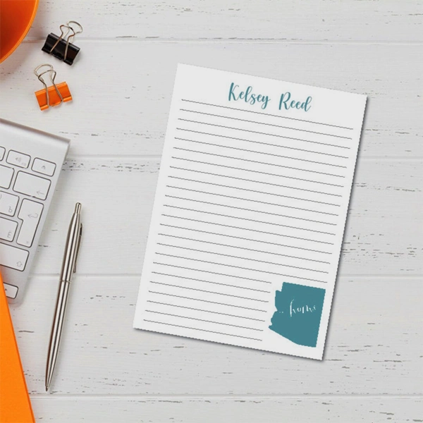 5 5 x 8 5 Notepad beside the product it was made to hold