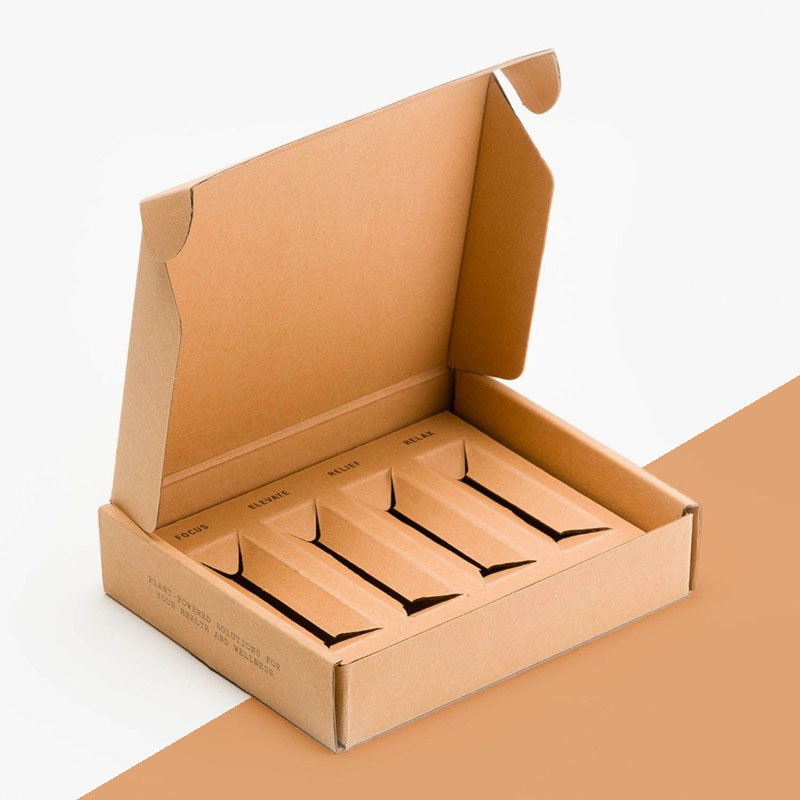Assorted Mailer Boxes — custom mailer boxes by Packmio Close detail of the print finish on assorted mailer boxes