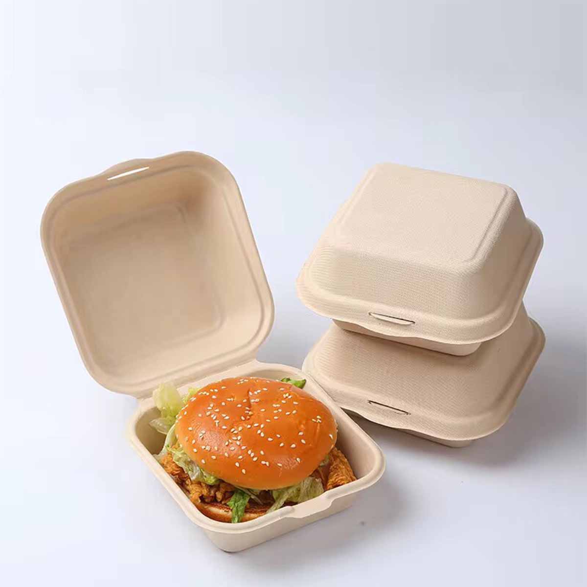 Bagasse Burger Boxes opened to show the inside print and construction