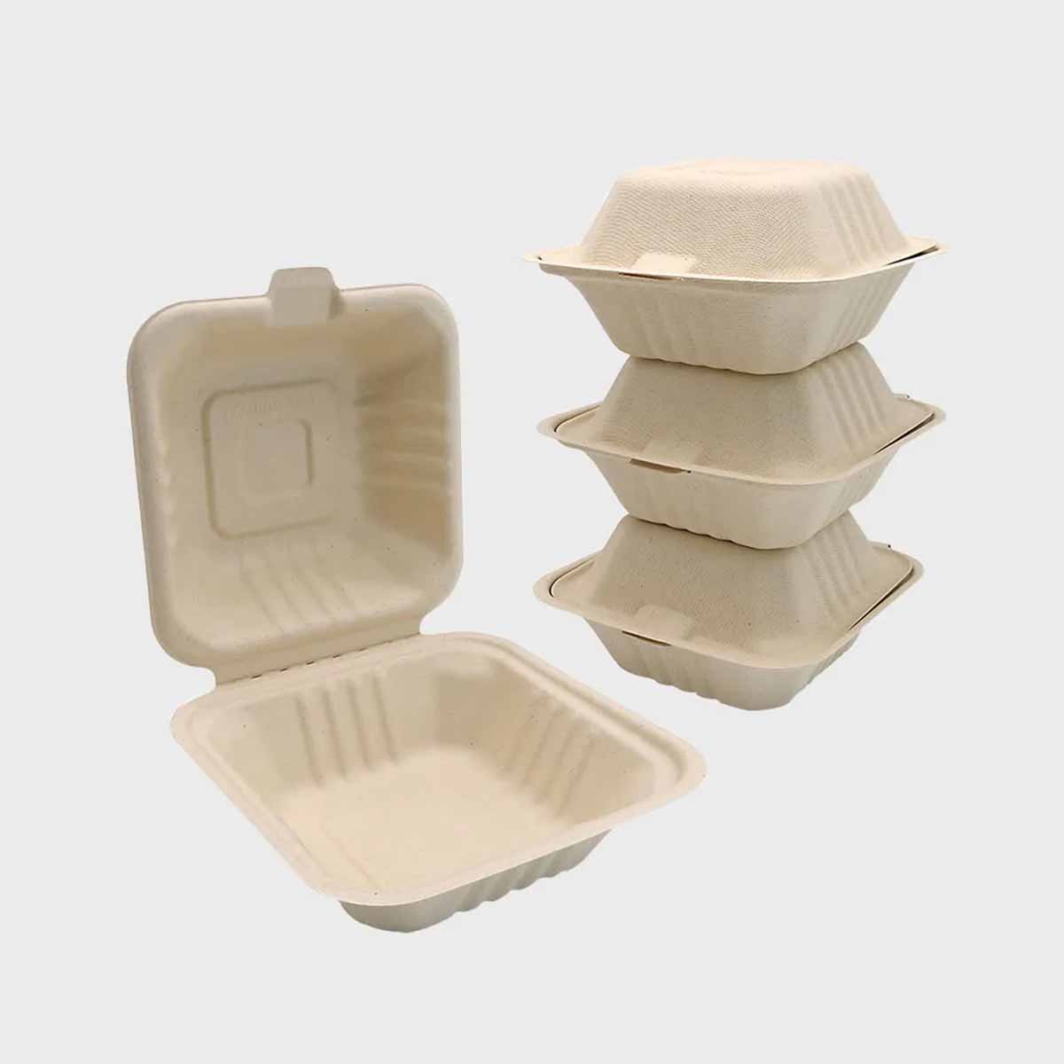 Bagasse Burger Boxes photographed at an angle to show the board thickness