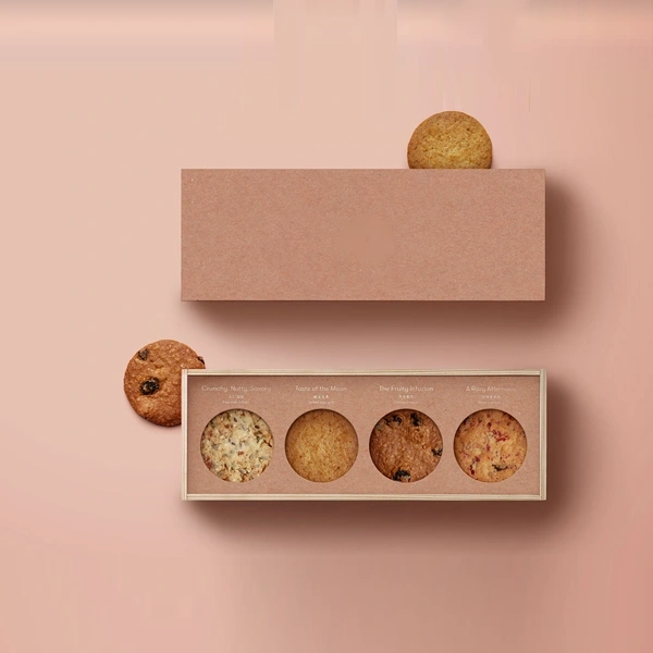 Biscuit Boxes — custom cookie boxes by Packmio Biscuit Boxes beside the product it was made to hold