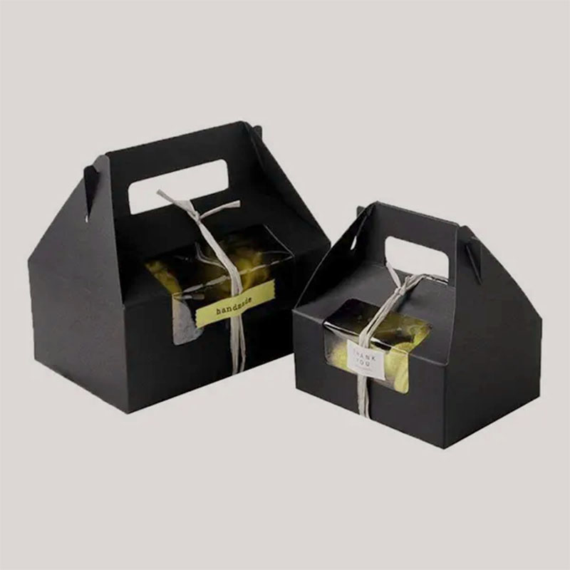 Black Gable Boxes — custom paper bags by Packmio Close detail of the print finish on black gable boxes