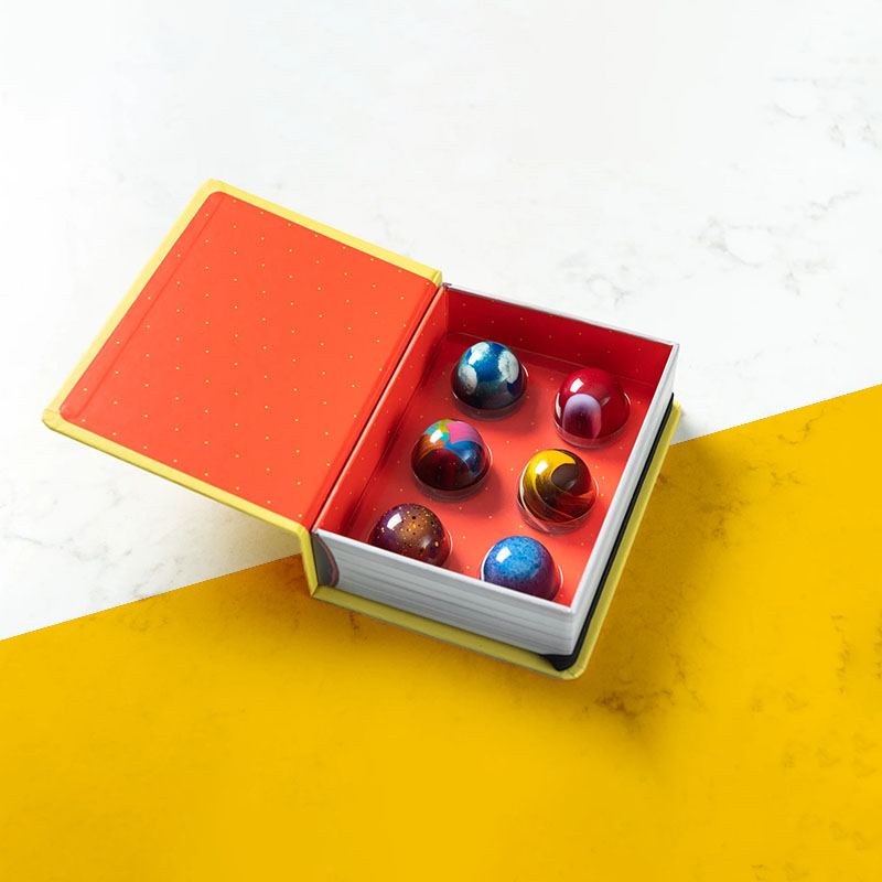 A stack of bon bon boxes in a custom size