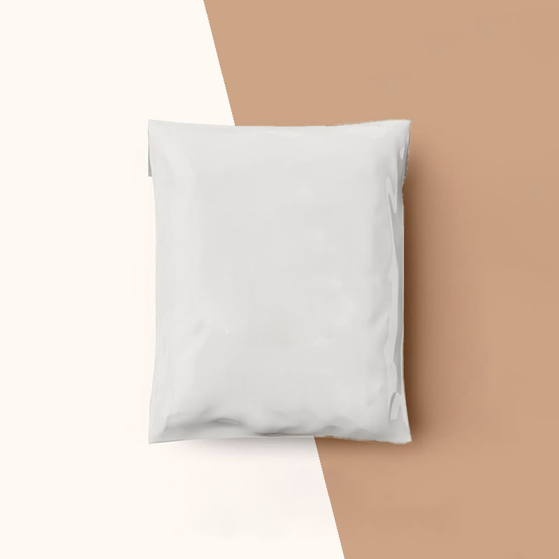A stack of branded poly mailers in a custom size