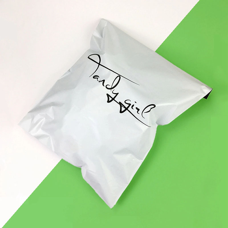 Branded Poly Mailers photographed at an angle to show the board thickness