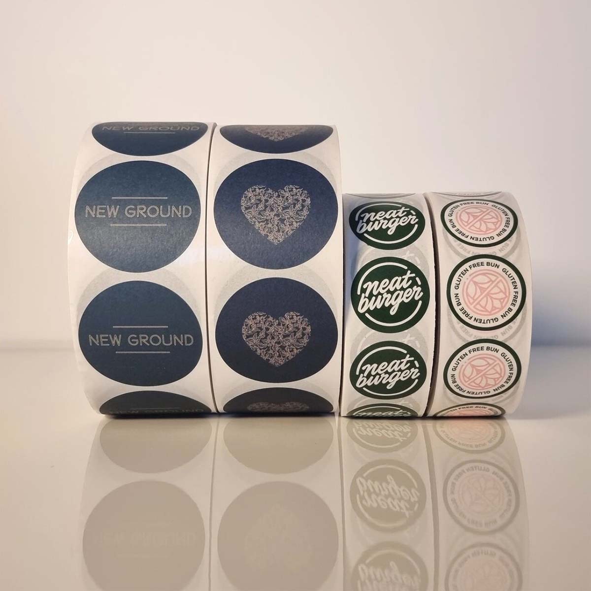 Stickers — custom stickers by Packmio Stickers beside the product it was made to hold
