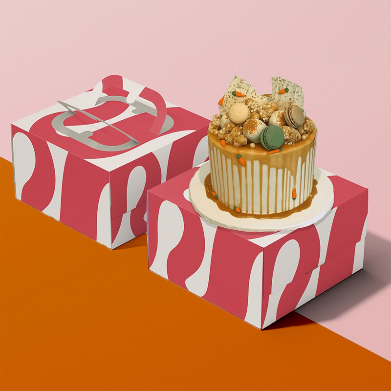 Cake Boxes photographed at an angle to show the board thickness