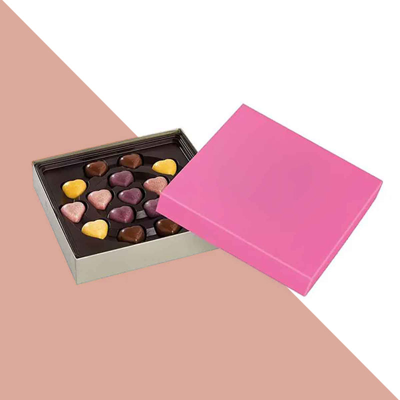 Candy Box with Dividers — custom candy boxes by Packmio Candy Box with Dividers photographed at an angle to show the board thickness