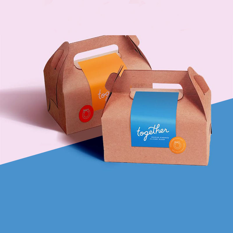 Cardboard Boxes with Handles — custom corrugated boxes by Packmio Cardboard Boxes with Handles in use, packed and ready to ship