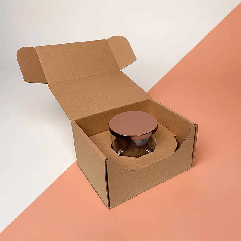 Cardboard Candle Boxes opened to show the inside print and construction