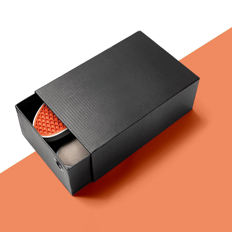 Cardboard Shoe Boxes opened to show the inside print and construction