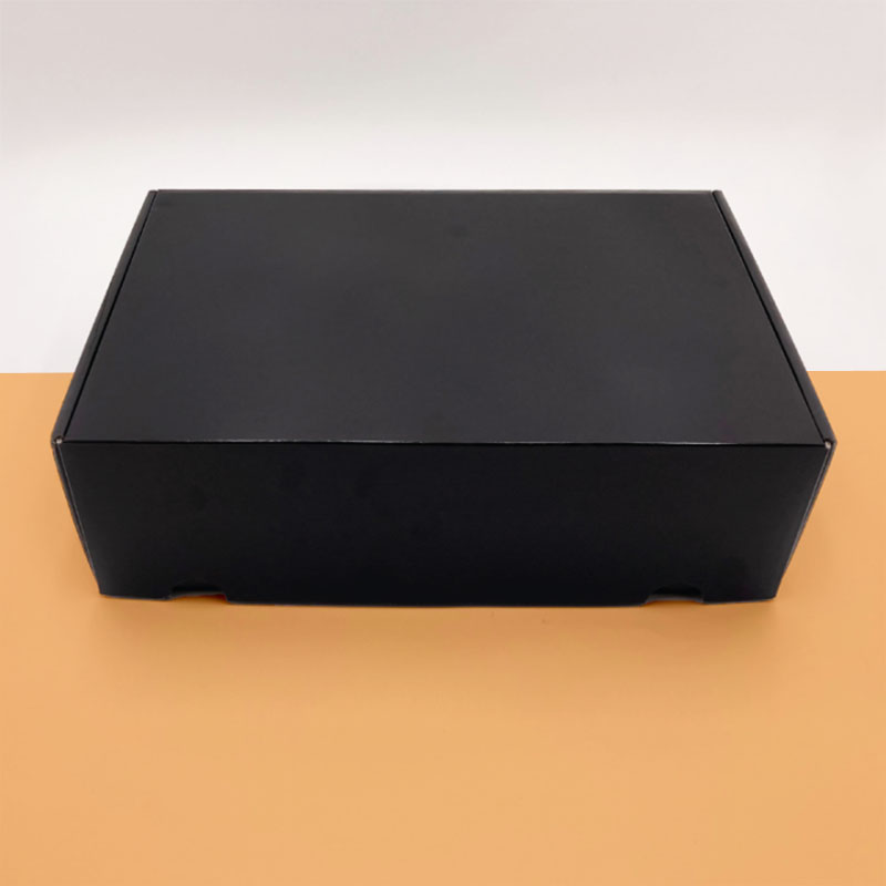 A stack of cardboard shoe boxes in a custom size