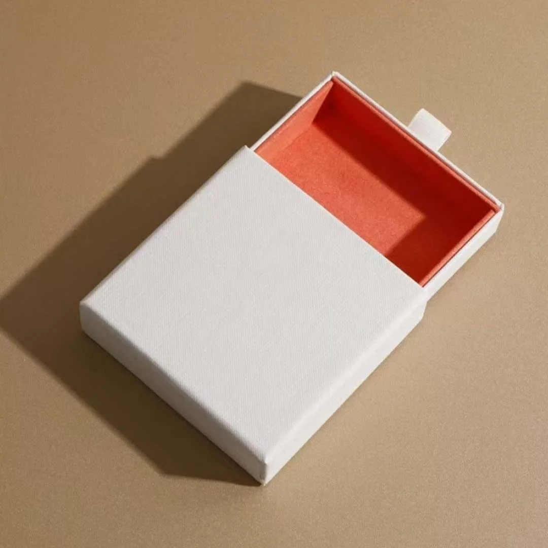 Cardboard Sleeve Boxes photographed at an angle to show the board thickness