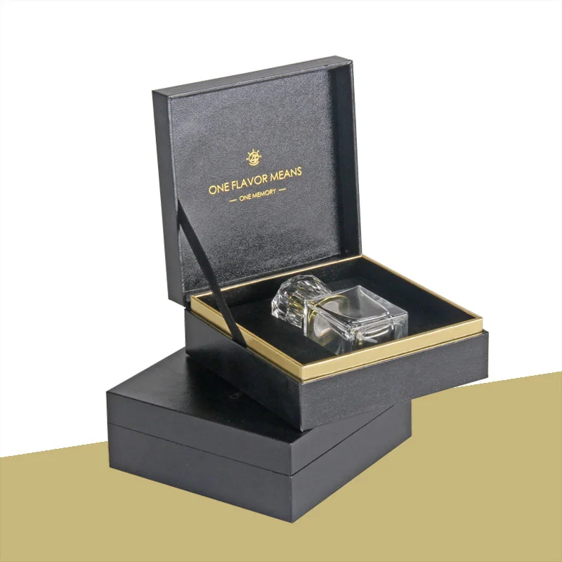 Clamshell Perfume Boxes beside the product it was made to hold