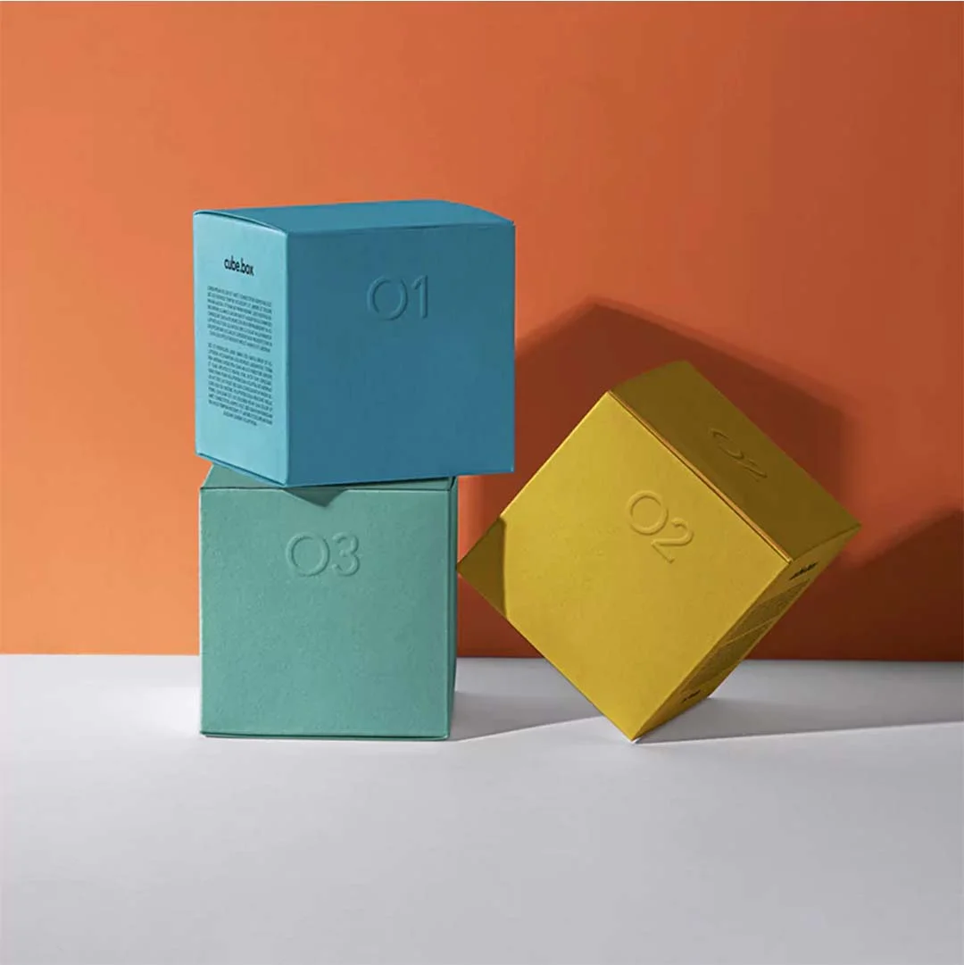 Cube Boxes — custom folding boxes by Packmio Cube Boxes in use, packed and ready to ship