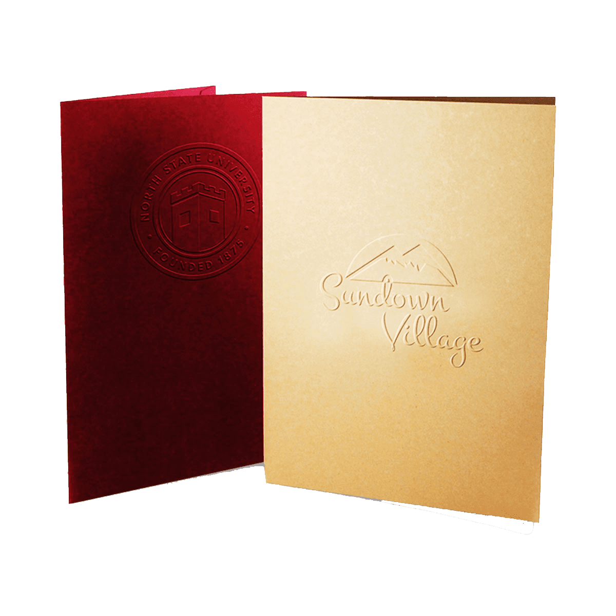 Embossed Folders photographed at an angle to show the board thickness