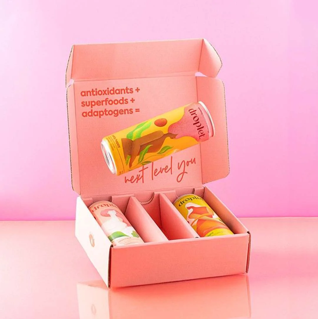 A stack of energy drink boxes in a custom size