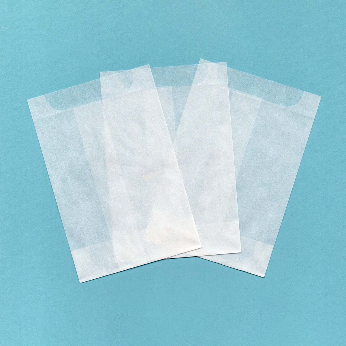 Glassine Paper opened to show the inside print and construction