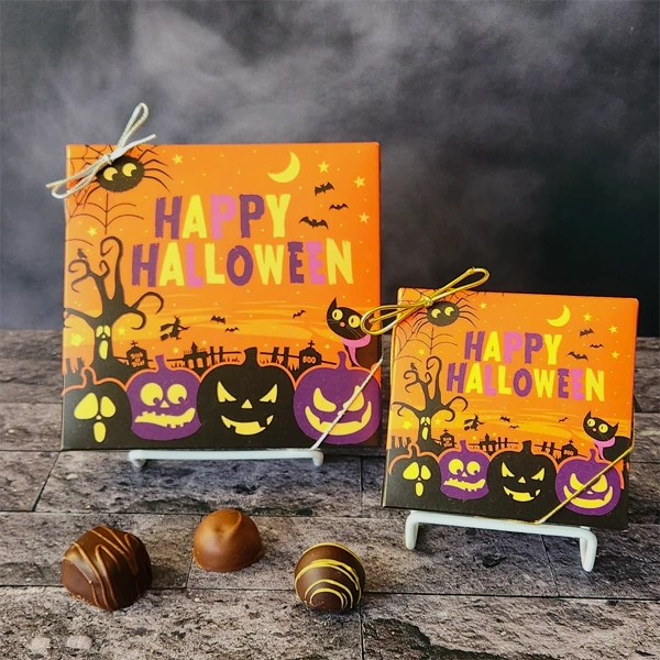Halloween Candy Boxes beside the product it was made to hold