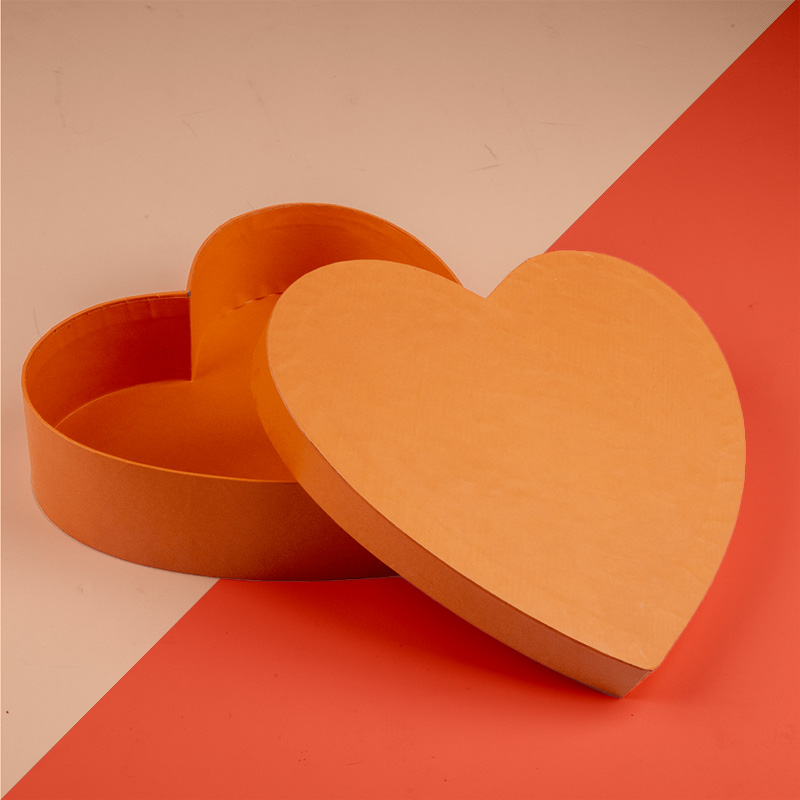 Heart Shape Boxes — custom folding boxes by Packmio Heart Shape Boxes in use, packed and ready to ship