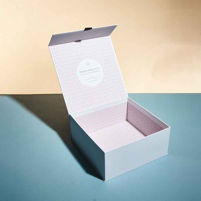 Hinged Lid Rigid Boxes — custom rigid boxes by Packmio Hinged Lid Rigid Boxes opened to show the inside print and construction