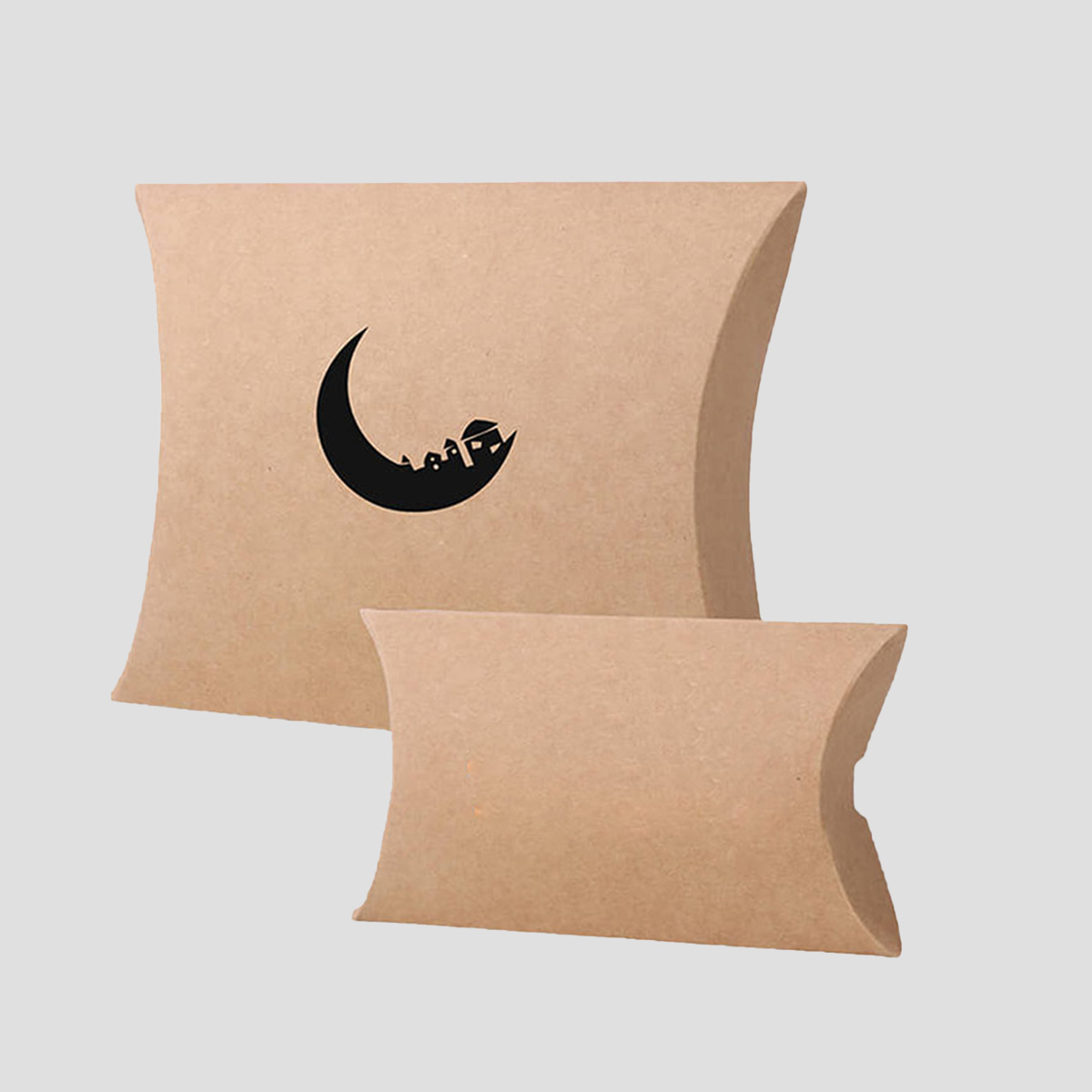 Kraft Pillow Boxes beside the product it was made to hold
