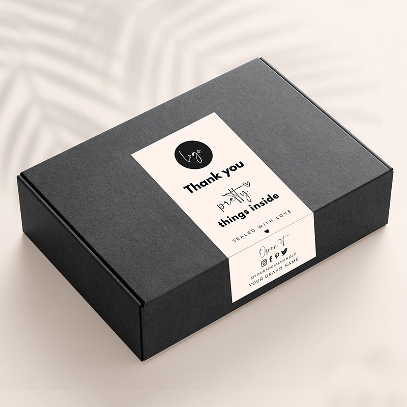 Labels photographed at an angle to show the board thickness