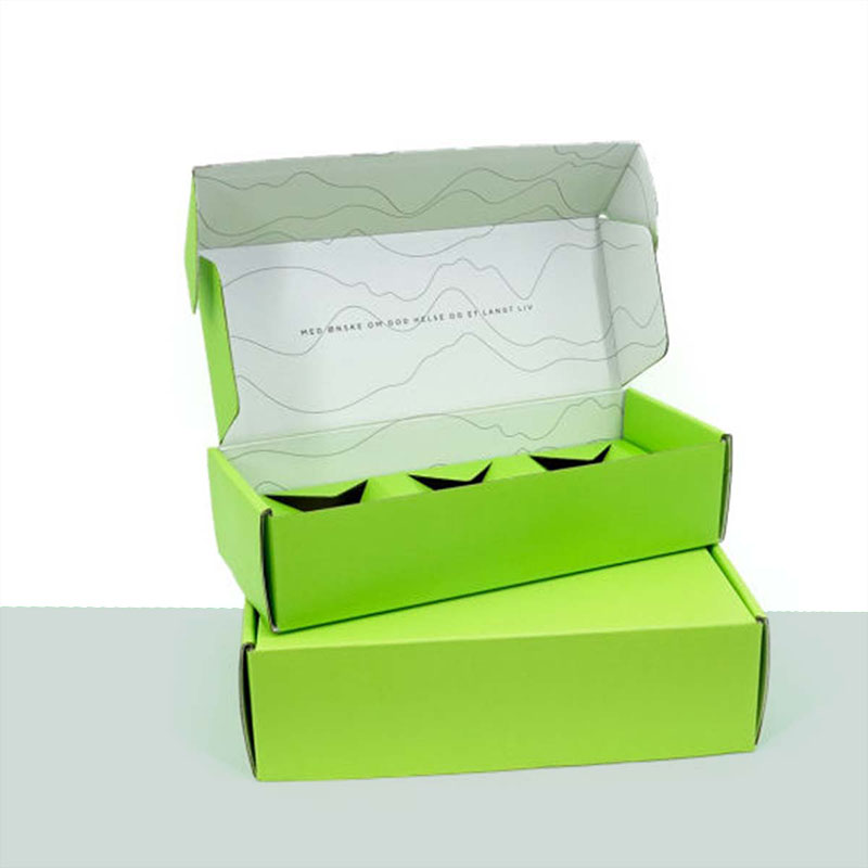 Mailer Boxes with Inserts photographed at an angle to show the board thickness