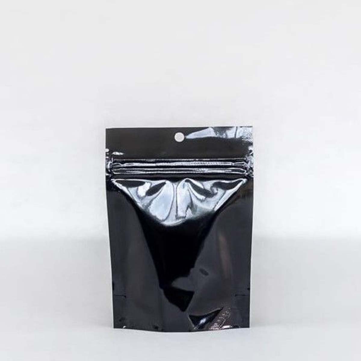 Mylar Bags — custom mylar bags by Packmio A stack of mylar bags in a custom size