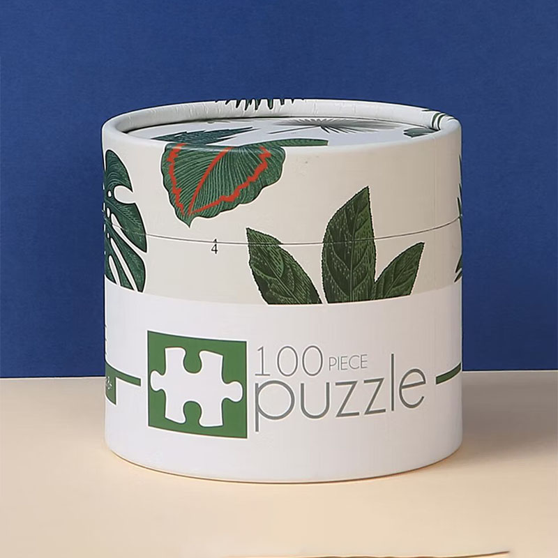Paperboard Tube Packaging Puzzle — custom game boxes by Packmio Paperboard Tube Packaging Puzzle photographed at an angle to show the board thickness