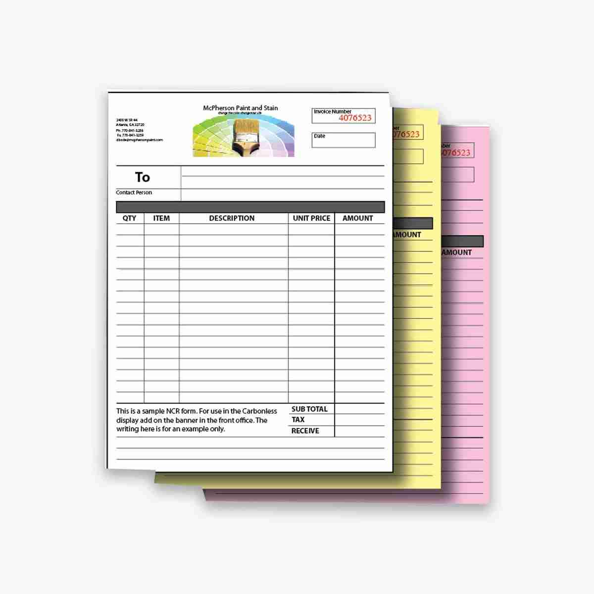 A stack of part carbonless forms boxes in a custom size