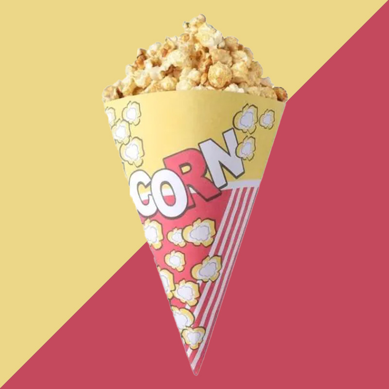 A stack of popcorn paper cones in a custom size