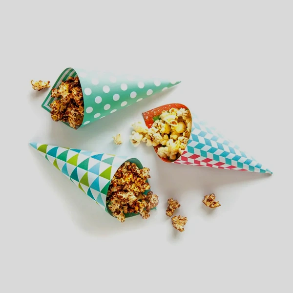 Popcorn Paper Cones in use, packed and ready to ship
