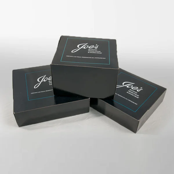 Promotional Boxes photographed at an angle to show the board thickness