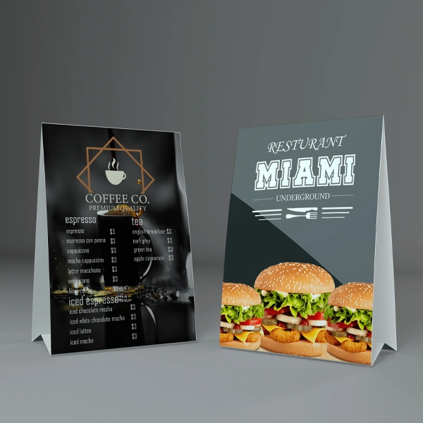 A stack of restaurant table tents in a custom size