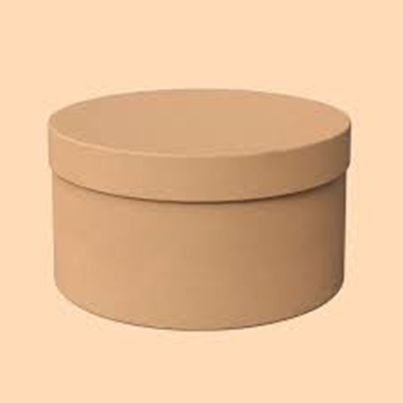 Round Kraft Boxes photographed at an angle to show the board thickness