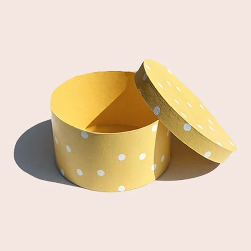 Round Kraft Boxes in use, packed and ready to ship