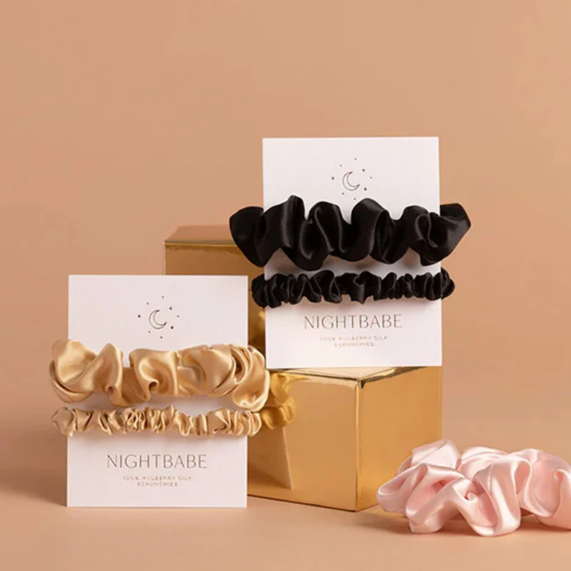 Scrunchie Boxes — custom apparel boxes by Packmio Scrunchie Boxes beside the product it was made to hold
