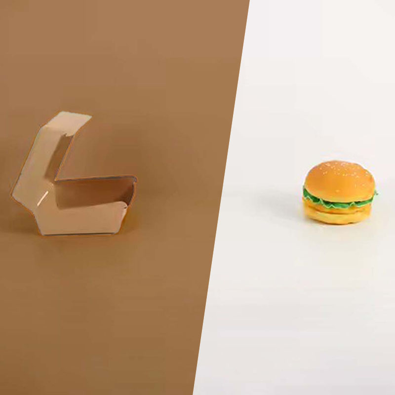 Small Burger Boxes — custom burger boxes by Packmio Small Burger Boxes photographed at an angle to show the board thickness