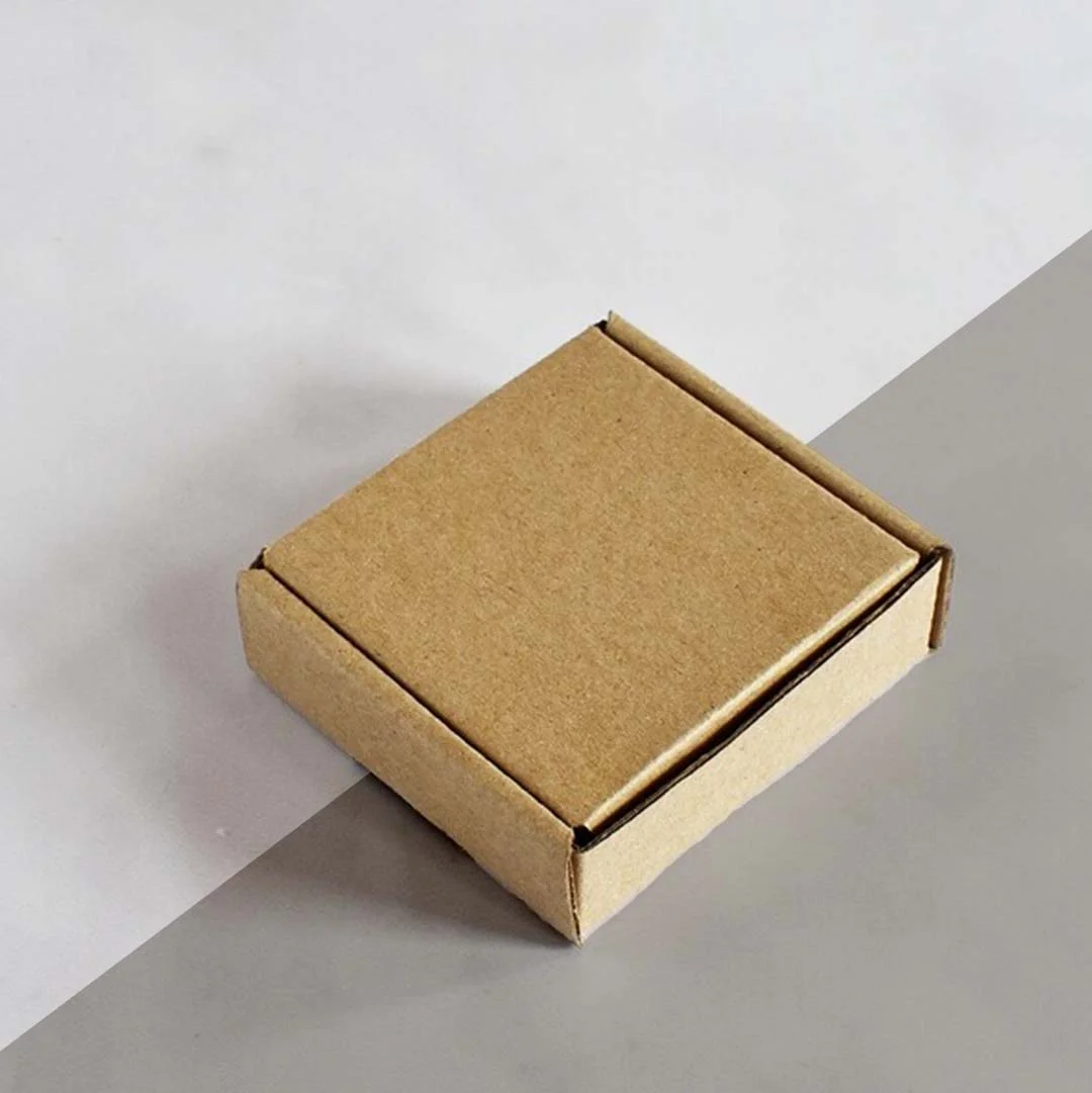 Small Cardboard Boxes photographed at an angle to show the board thickness