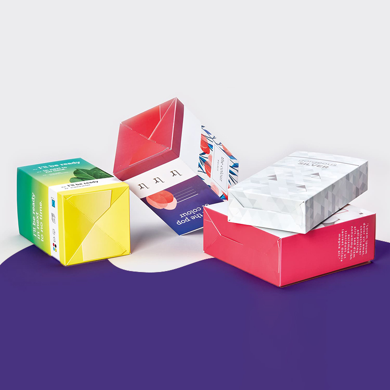 Snap Lock Bottom Boxes — custom tuck boxes by Packmio Snap Lock Bottom Boxes in use, packed and ready to ship