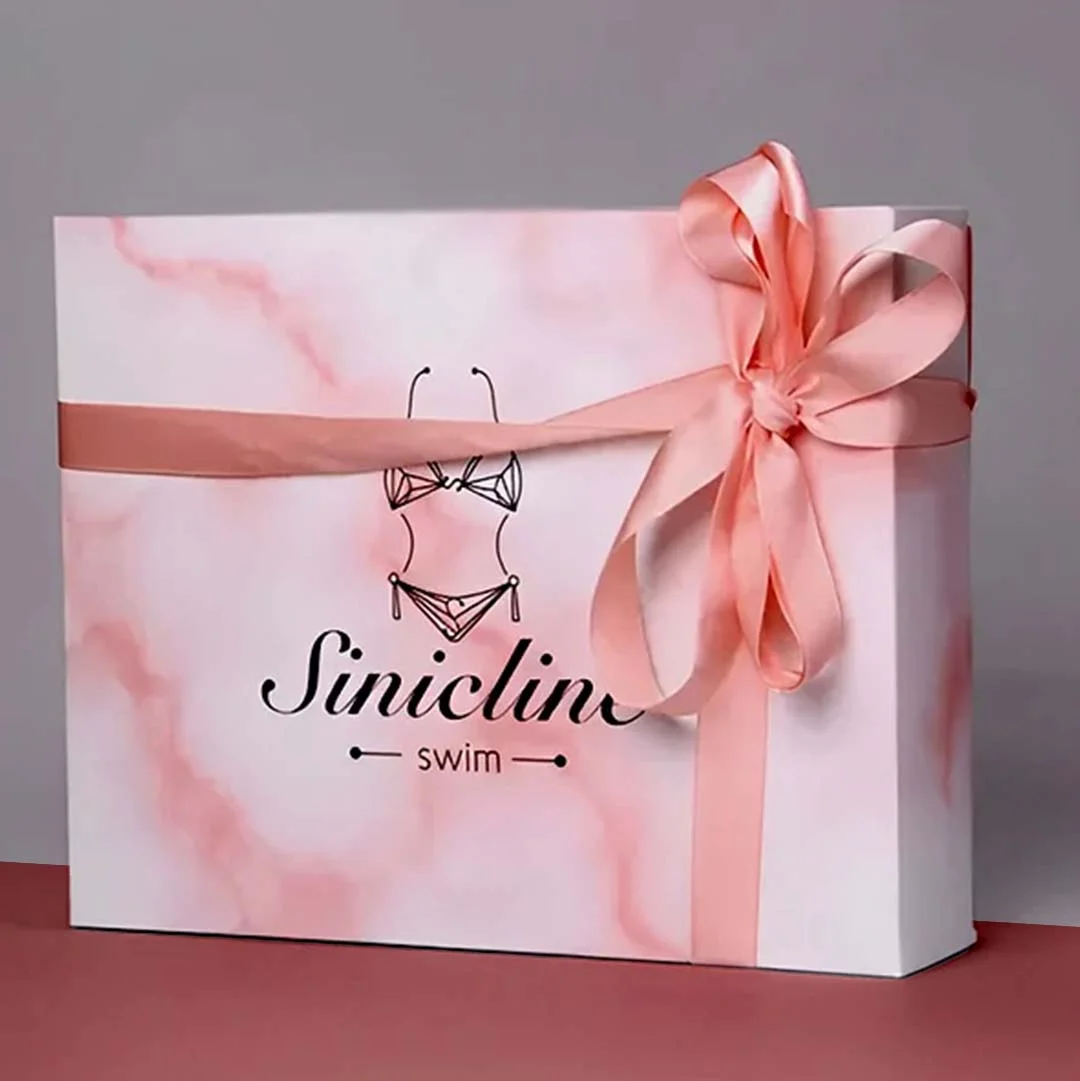 A stack of swimwear boxes in a custom size