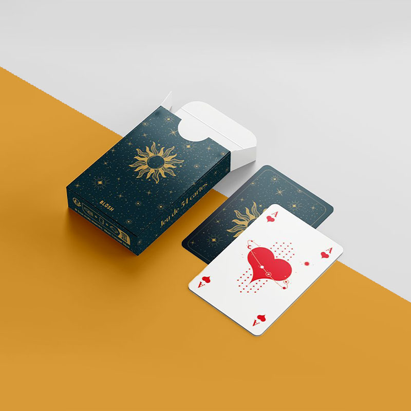 A stack of tuck boxes for playing cards in a custom size