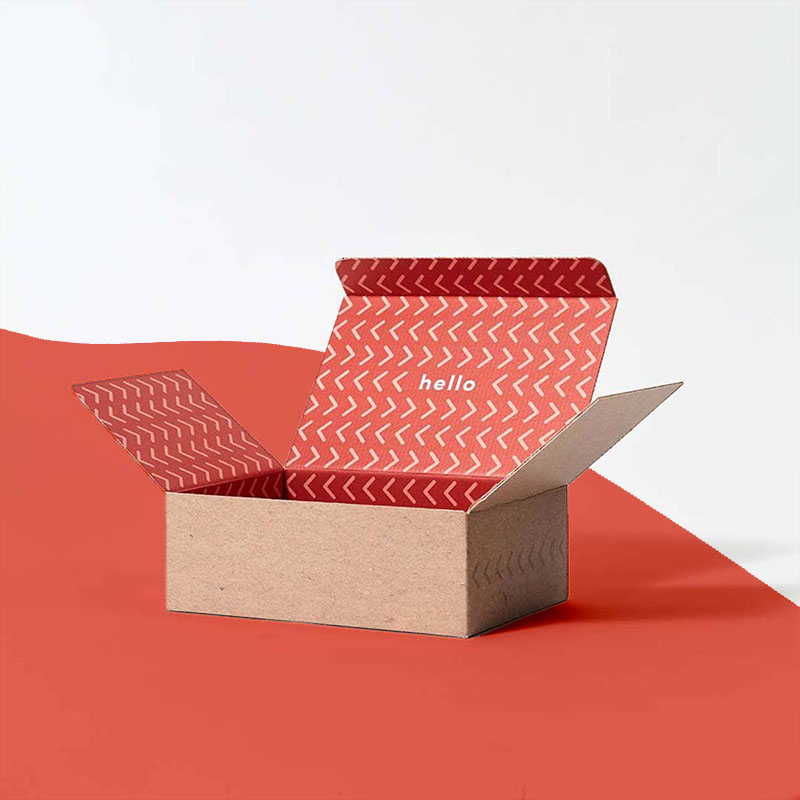A stack of tuck top mailer boxes in a custom size