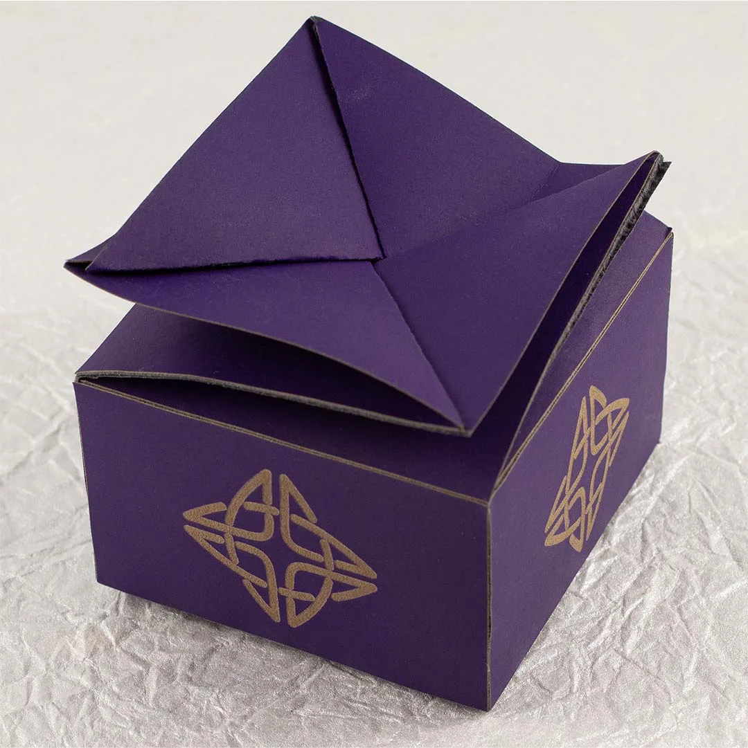 Twist Top Boxes photographed at an angle to show the board thickness
