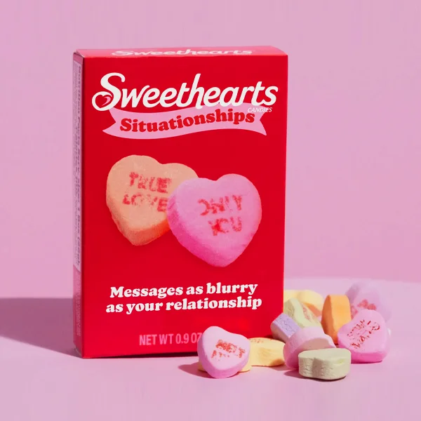 Valentine Candy Boxes beside the product it was made to hold